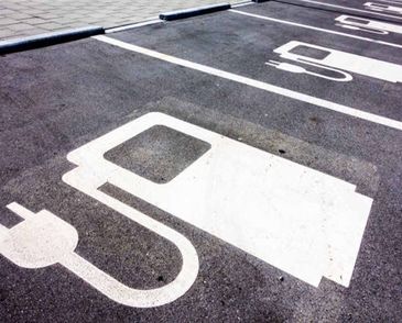 Electric vehicle charger parking space