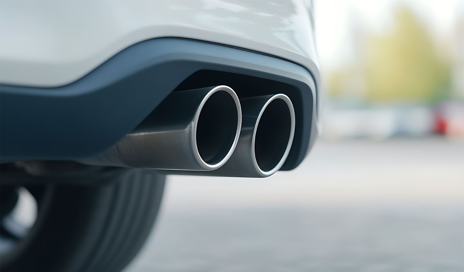 Back of a petrol vehicle showing exhaust pipe