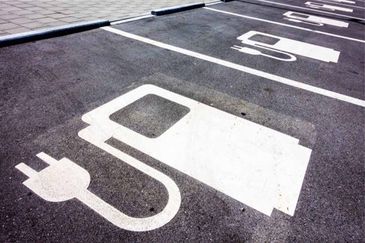 Electric vehicle charger parking space